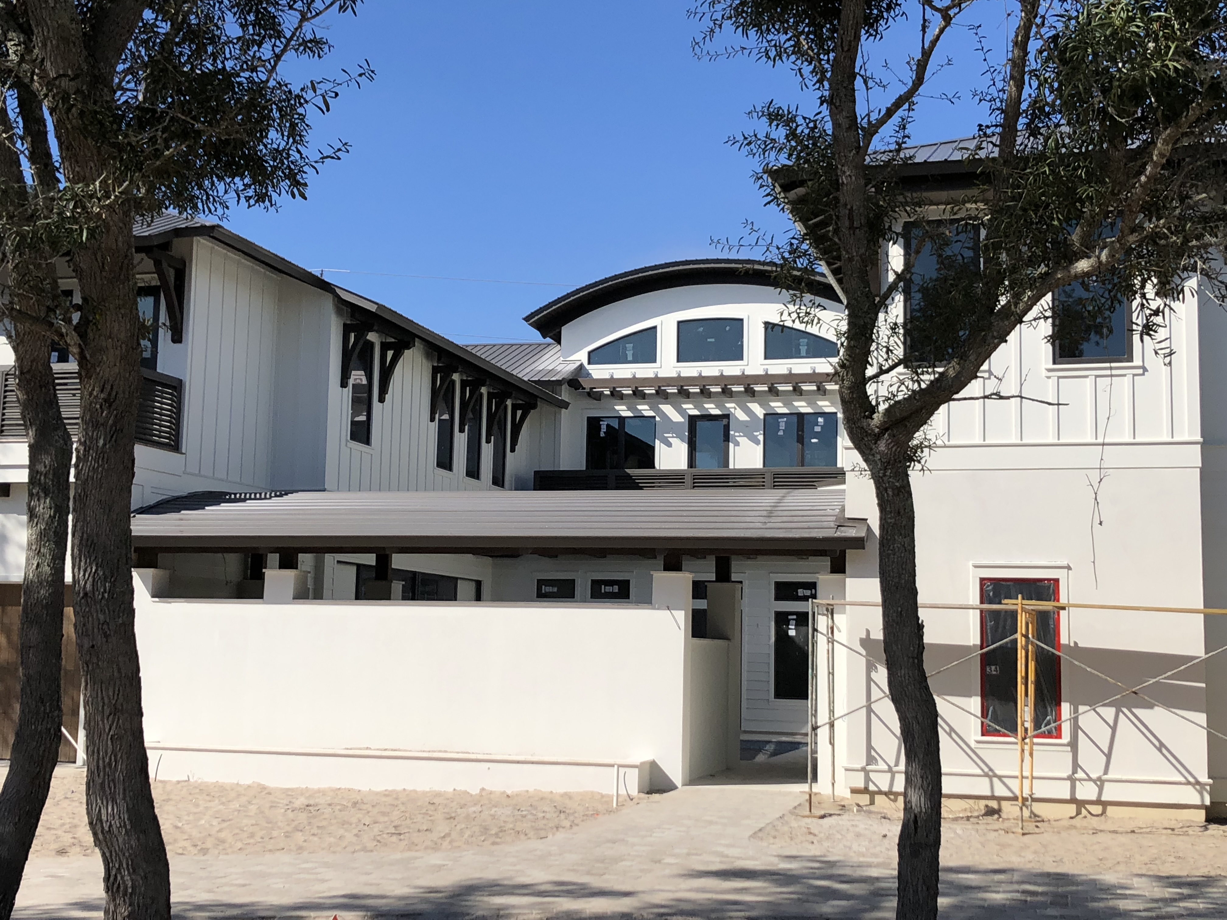 A fully finished house against a clear sky
